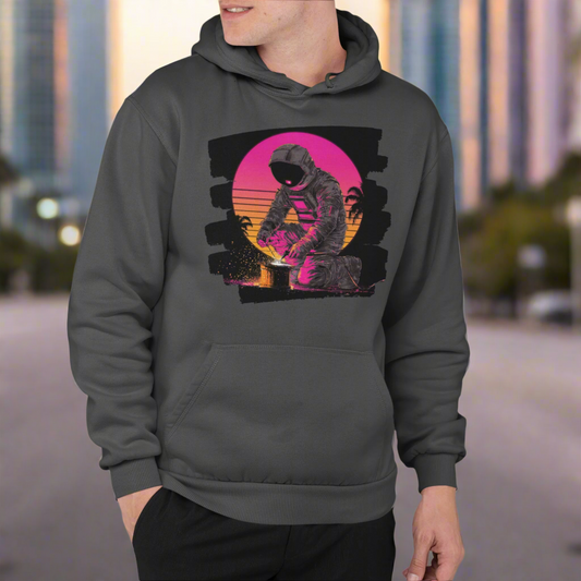 Person wearing a dark gray hoodie with a graphic design on a beige background