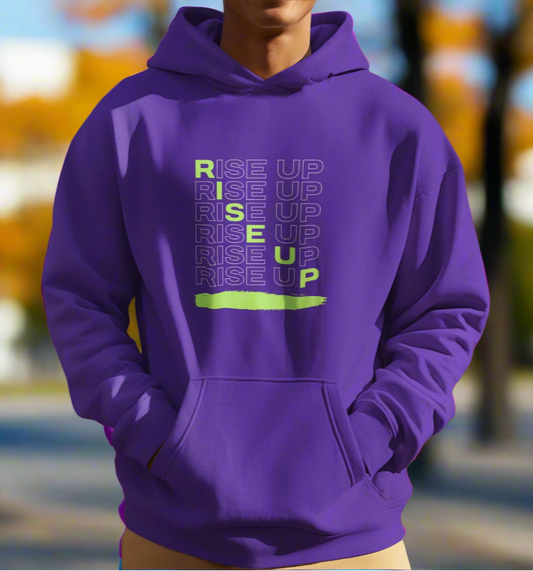 Person wearing a purple hoodie with 'RISE UP' text in a mountainous landscape